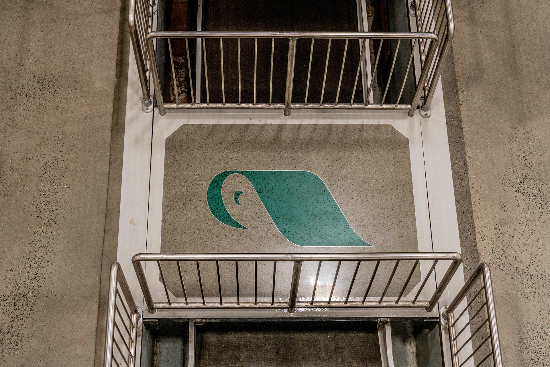 an example of a logo professionally placed in a polished concrete floor