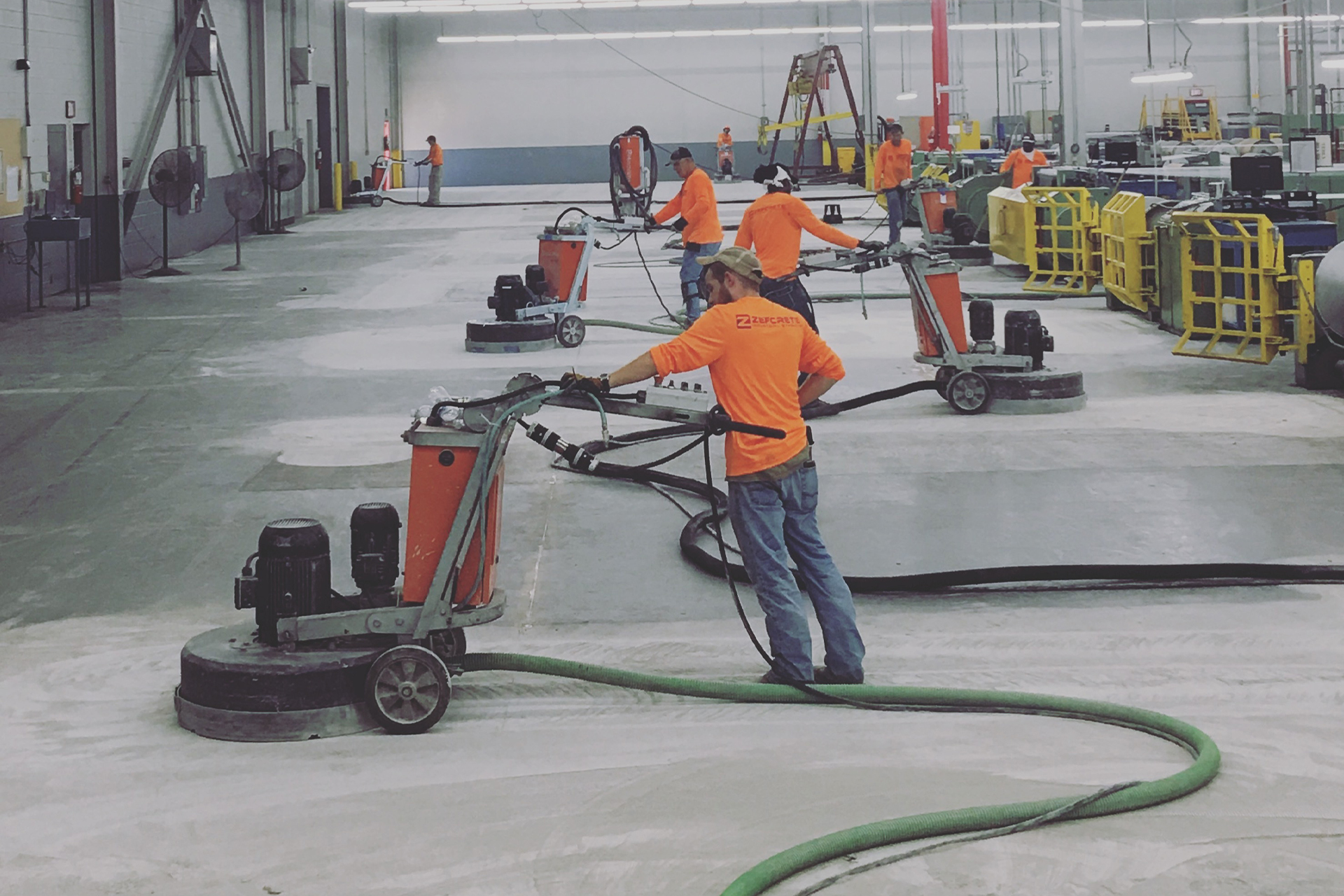 polished concrete floors being installed by professional team