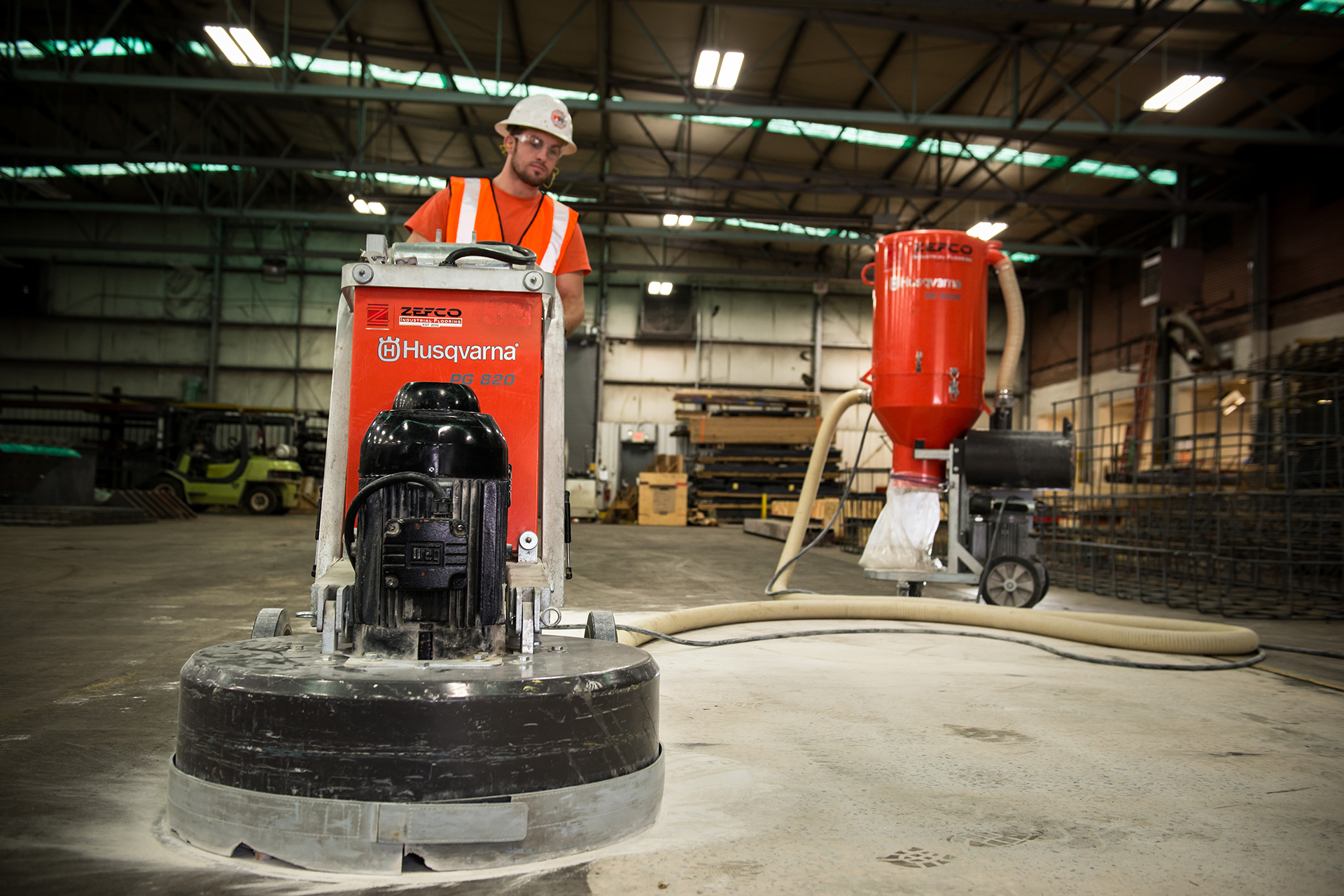 Professional polished concrete service provider working on a project